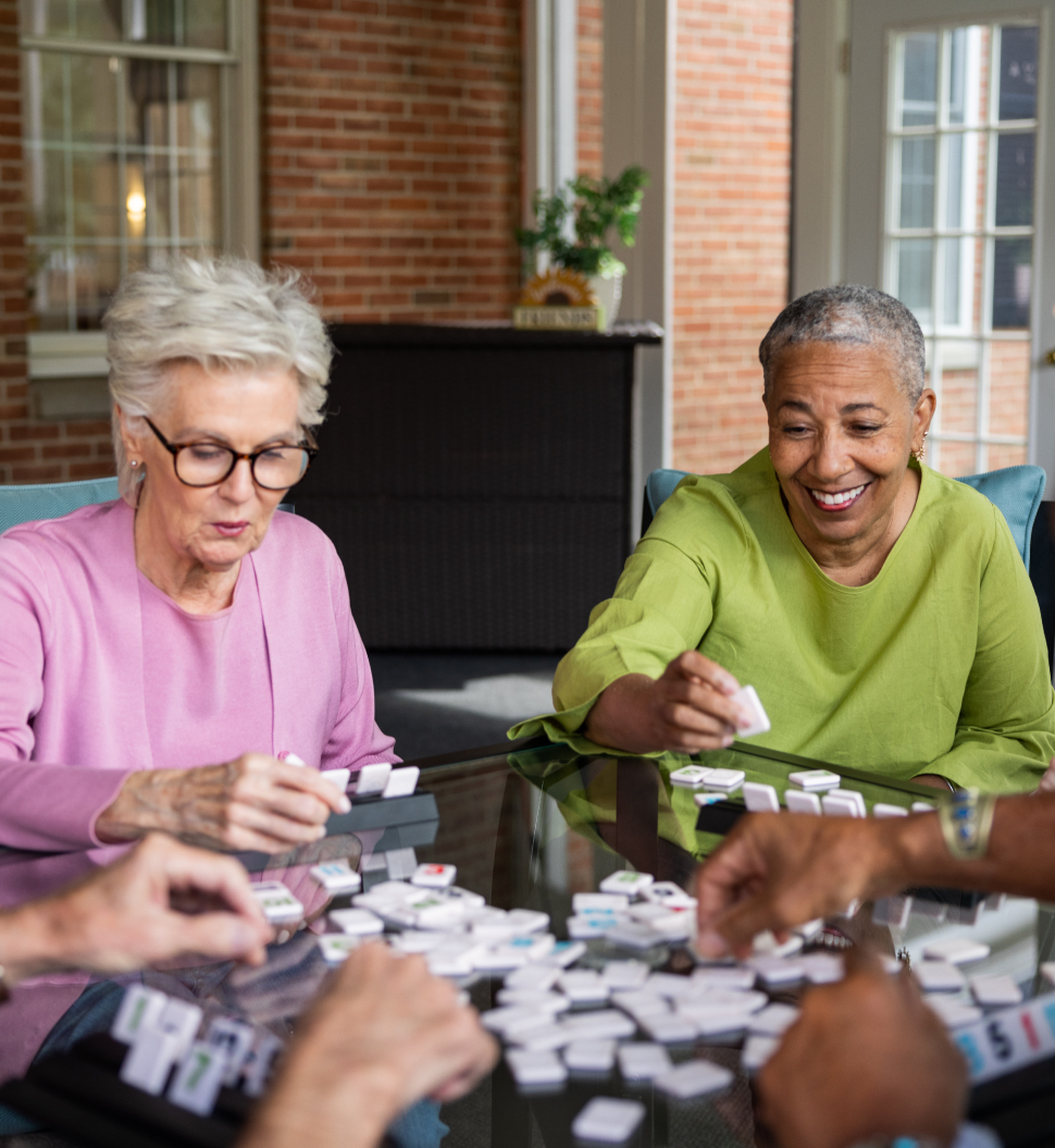 senior women playing board game