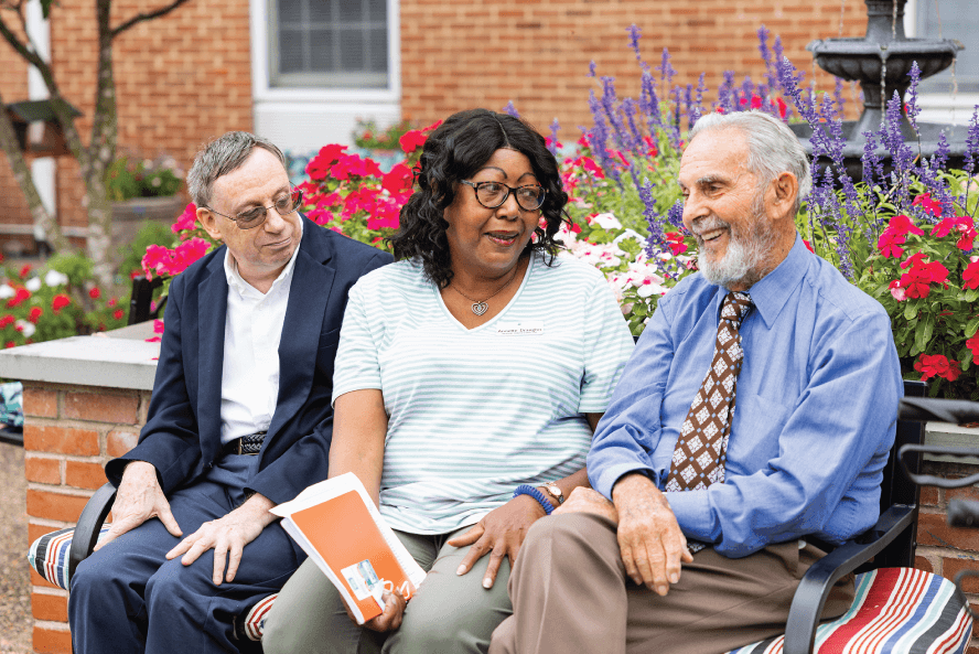 group of seniors relaxing in the garden