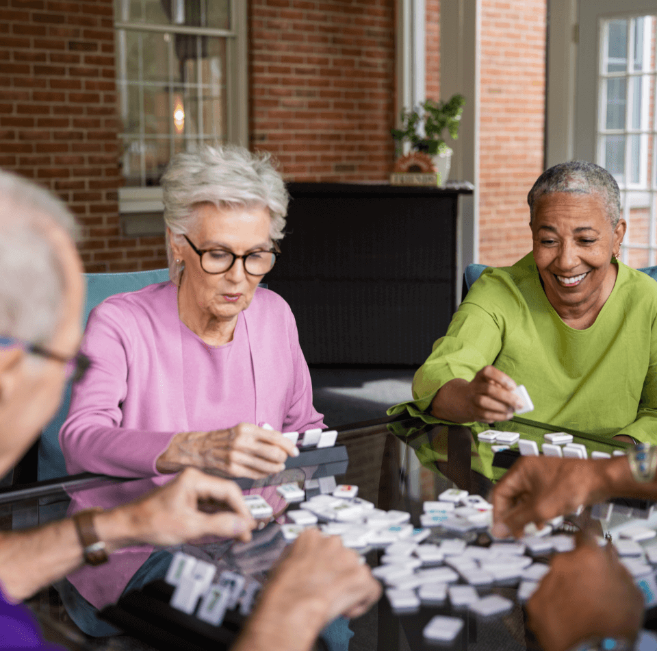 Senior group playing dominos